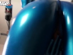 Kinky Fiona in blue latex showing her pussy slit