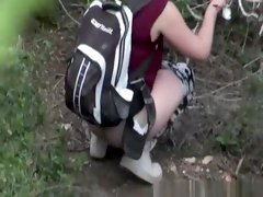 Two women caught peeing in the nature