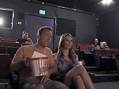 Dashing beauty devours cock at the cinema in pretty indecent rounds